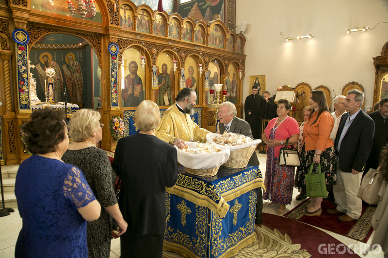 The Laity collecting Prosforo at St Nicholas Church, distributed by Archbishop Makarios